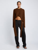 Front full length image of model wearing Ribbed Cotton Wrap Sweater in ESPRESSO with straps hanging by sides
