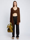 Front full length image of model wearing Ribbed Cotton Relaxed Cardigan in ESPRESSO with belt removed