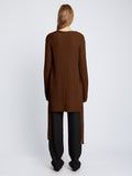 Back full length image of model wearing Ribbed Cotton Relaxed Cardigan in ESPRESSO