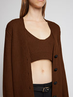 Detail image of model wearing Ribbed Cotton Relaxed Cardigan in ESPRESSO