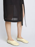 Image of model wearing GLOVE SLIPPERS in Light Beige