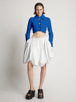 Front full length image of model wearing Boucle Tweed Crop Jacket in TURQUOISE