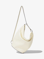 Front image of Leather Spring Bucket Bag in IVORY with strap extended