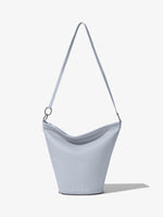 Front image of Spring Bag In Leather in ash with strap extended