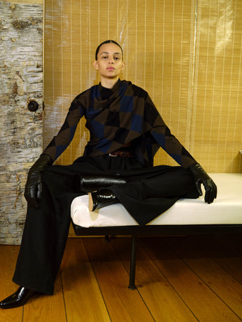 Proenza Schouler image of model sitting wearing Vanne Top In Argyle Velvet Knit in Navy Multi