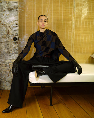 Proenza Schouler image of model sitting wearing Vanne Top In Argyle Velvet Knit in Navy Multi