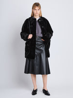 Front full length image of model wearing Penelope Coat in BLACK