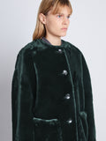 Detail image of model in Penelope Coat In Faux Mink in pine
