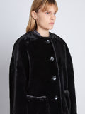 Detail image of model wearing Penelope Coat in BLACK