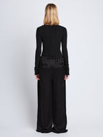 Back full length image of model wearing Hazel Pant in BLACK