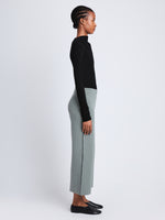 Side full length image of model wearing Grace Pant in POPLAR/BLACK