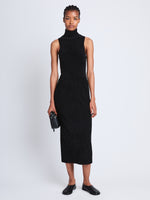 Front full length image of model wearing Dylan Turtleneck Dress in BLACK