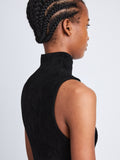 Detail image of model wearing Dylan Turtleneck Dress in BLACK