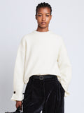 Front cropped image of model wearing Tara Sweater in OFF WHITE