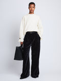 Front full length image of model wearing Tara Sweater in OFF WHITE