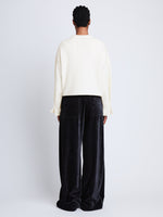Back full length image of model wearing Tara Sweater in OFF WHITE