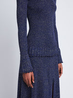 Detail image of model wearing Avery Turtleneck in ROYAL BLUE/SILVER