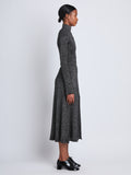 Side full length image of model wearing Lidia Skirt in BLACK/SILVER