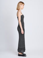 Side full length image of model wearing Lorenia Dress in BLACK/SILVER