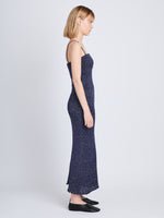 Side full length image of model wearing Lorenia Dress in ROYAL BLUE/SILVER