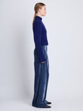 Side full length image of model wearing Aria Pant in STEEL BLUE