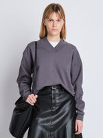 Front cropped image of model wearing Olivia Sweatshirt in GRAPHITE