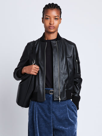Front cropped image of model wearing Mika Bomber Jacket in BLACK