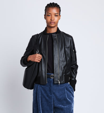 Front cropped image of model wearing Mika Bomber Jacket in BLACK