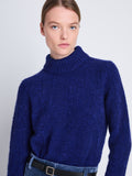 Detail image of model wearing Brigitt Sweater in COBALT MELANGE