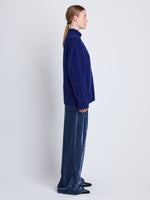Side full length image of model wearing Alana Cardigan in COBALT MELANGE