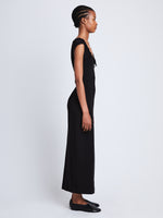 Side full length image of model wearing Nina Dress in BLACK