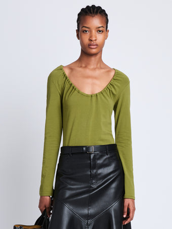 Front cropped image of model wearing Sophia Top in MILITARY