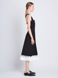 Side image of model wearing Edie Dress in BLACK/WHITE