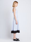 Side full length image of model wearing Edie Dress in ARCTIC/BLACK