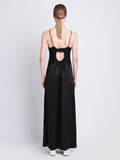 Back full length image of model wearing Harper Backless Dress in BLACK