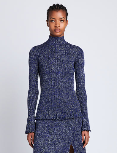 Front cropped image of model wearing Avery Turtleneck in ROYAL BLUE/SILVER