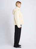Side image of model in Daylia Jacket In Faux Leather in parchment
