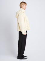 Side image of model in Daylia Jacket In Faux Leather in parchment