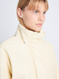 Detail image of model in Daylia Jacket In Faux Leather in parchment