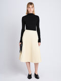Front image of model wearing Daphne Skirt In Faux Leather in parchment
