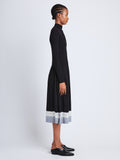 Side full length image of model wearing Lila Dress in BLACK/ASH