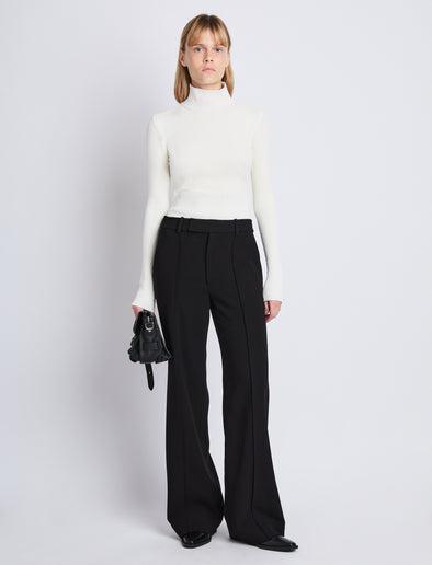 Front image of model wearing Weyes Pant in Matte Viscose Crepe in black