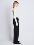 Side image of model wearing Weyes Pant in Matte Viscose Crepe in black