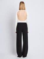 Back image of model wearing Weyes Pant in Matte Viscose Crepe in black