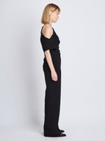 Side full length image of model wearing Francesa Off The Shoulder Top in BLACK