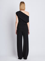 Back full length image of model wearing Francesa Off The Shoulder Top in BLACK