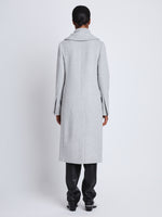 Back image of model wearing Louise Coat In Wool Cashmere in light grey melange