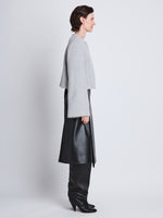 Side image of model wearing Brigdet Cropped Jacket With Leather Collar in LIGHT GREY MELANGE with no collar