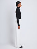 Side image of model wearing Weyes Pant In Matte Viscose Crepe in white