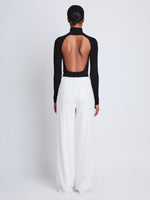 Back image of model wearing Weyes Pant In Matte Viscose Crepe in white